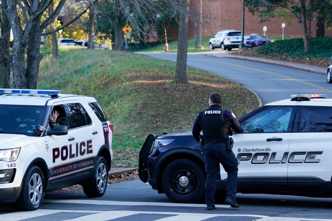 Police on Monday secure the crime scene of an overnight shooting at the University of Virginia in Charlottesville.