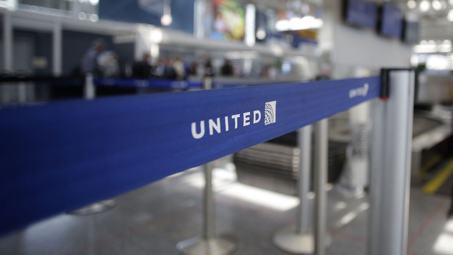 An airport worker walks through the United Airlines terminal at O'Hare International Airport on April 12, 2017 in Chicago, Illinois. 
