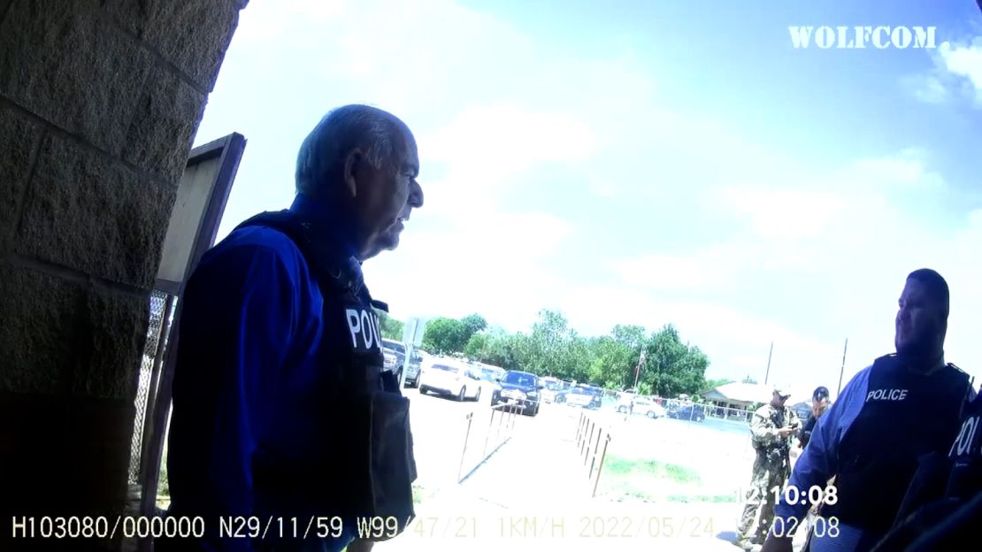 Pargas, left, here being asked by one of his officers if they had to wait for a specialist team, told investigators he assumed school police chief Pedro "Pete" Arredondo was in charge.