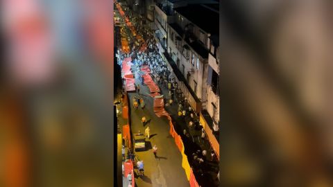 Residents on the streets of Guangzhou appeared to defy Covid restrictions.