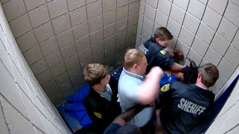 Video shows corrections officers beating Black man in custody | CNN