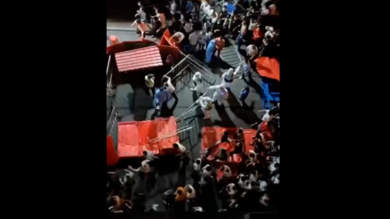 Video: Guangzhou residents tear down road barriers in defiance of Covid lockdown | CNN