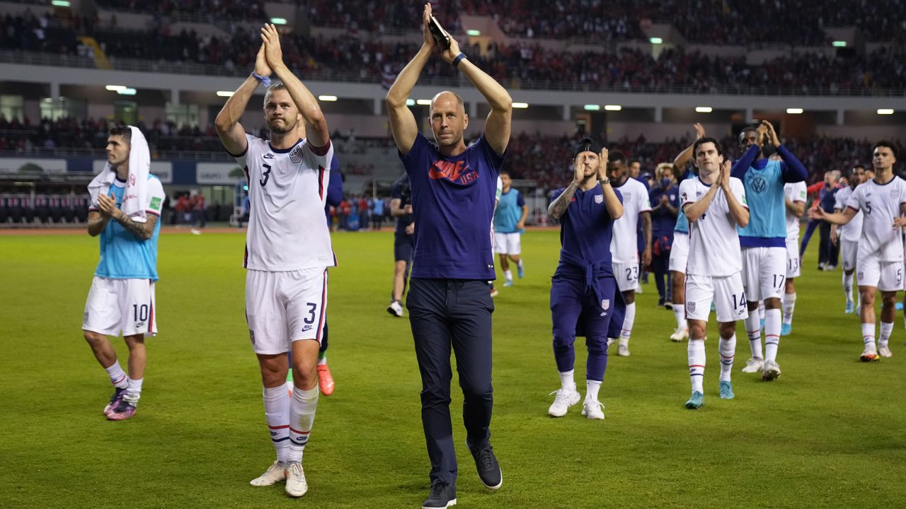 Gregg Berhalter celebrates qualifying for the World Cup.