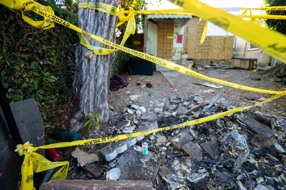 The scene where actress Anne Heche crashed a car into a house on August 5, as seen nine days later.