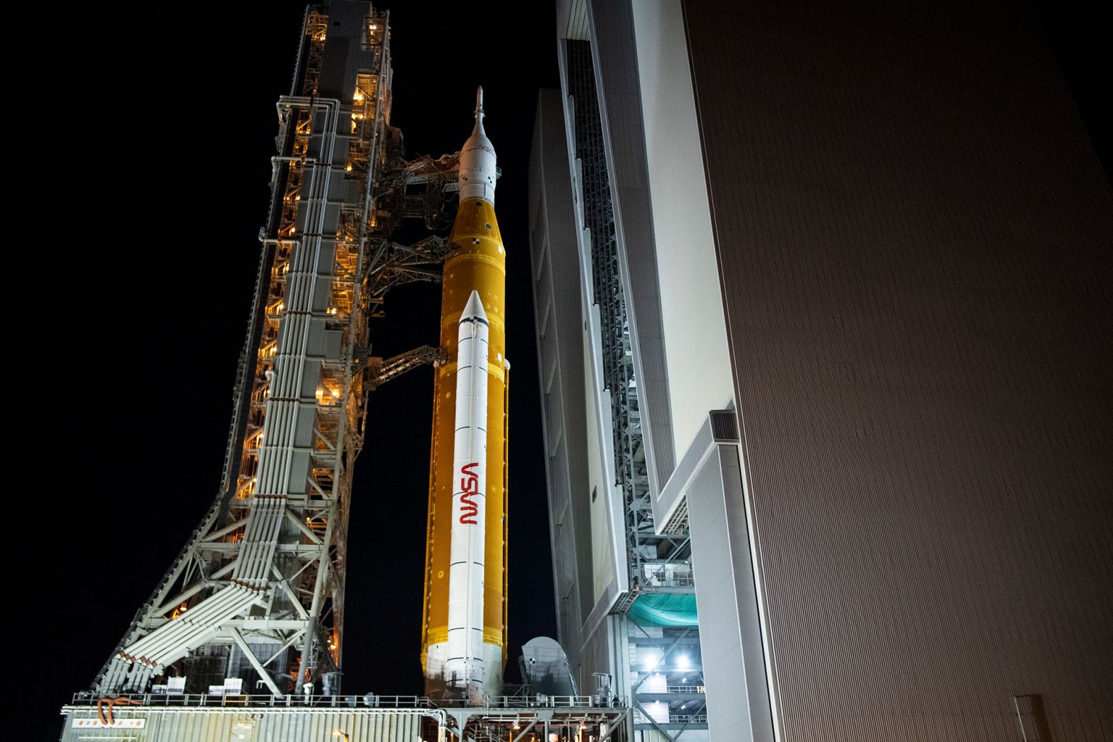 The Artemis I rocket rolls out of the Vehicle Assembly Building on its way back to Launch Pad 39B shortly after midnight on November 4.