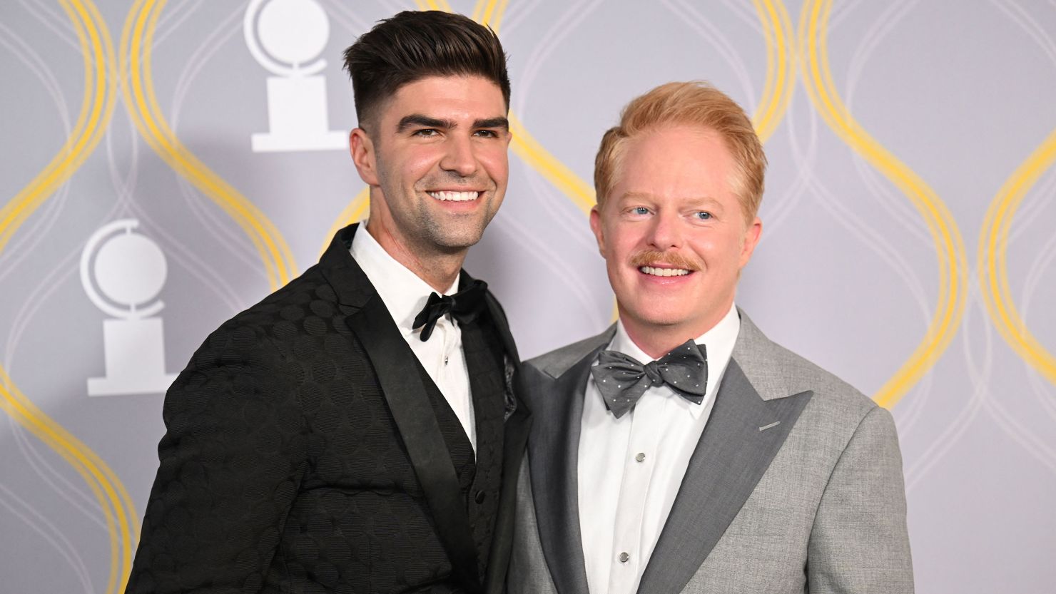 US actor Jesse Tyler Ferguson and husband Justin Mikita (L) attend the 75th annual Tony awards at Radio City Music Hall on June 12, 2022 in New York city.