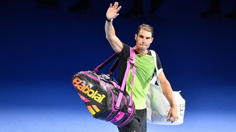 Nadal waves to the crowd after his loss to Auger-Aliassime.