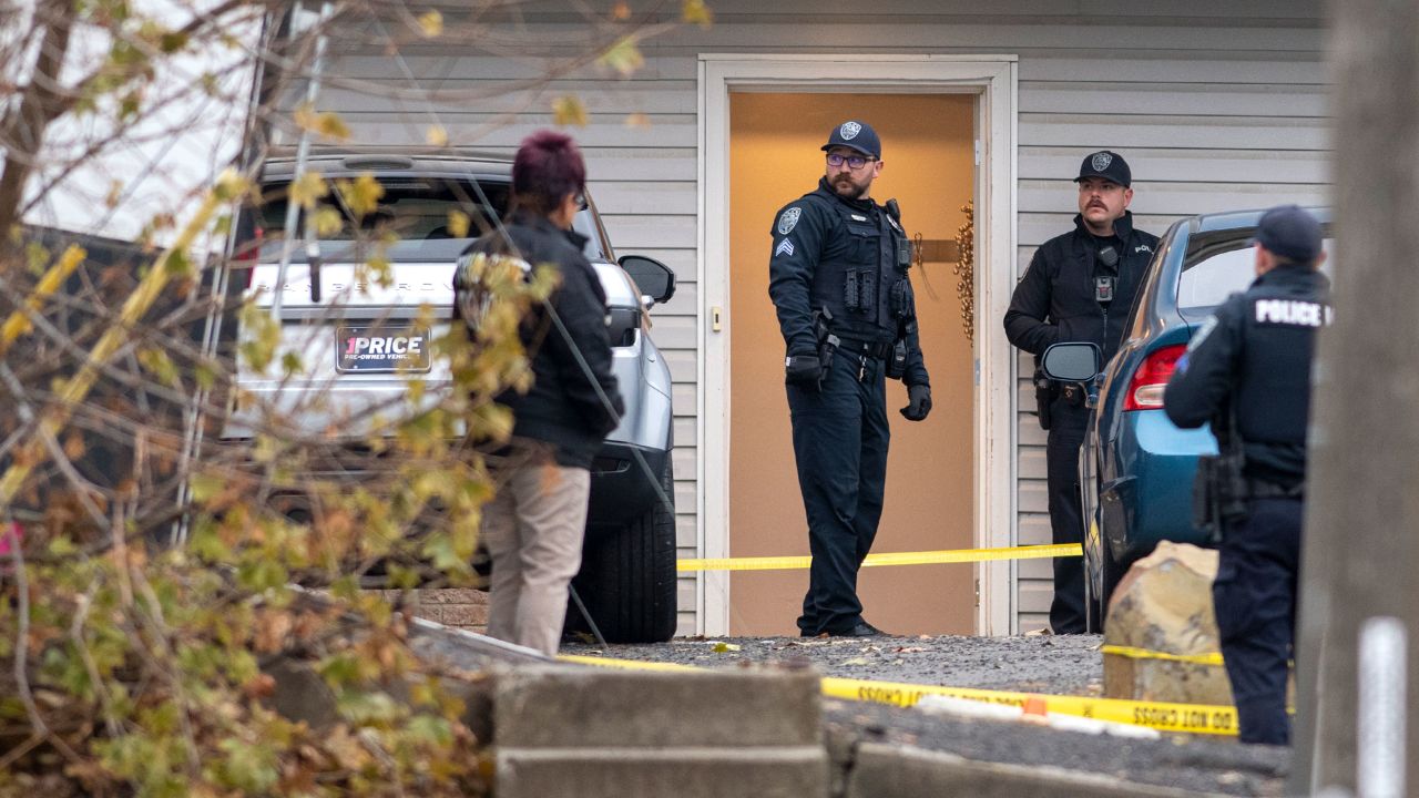 Officers investigate a homicide at an apartment complex south of the University of Idaho campus on Sunday, Nov. 13, 2022. Four people were found dead on King Road near the campus, according to a city of Moscow news release issued Sunday afternoon. (Zach Wilkinson/The Moscow-Pullman Daily News via AP)