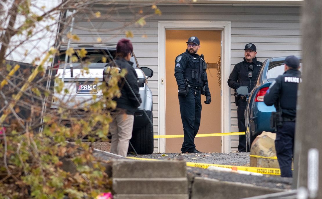 Officers investigate a homicide at an apartment complex south of the University of Idaho campus on November 13.