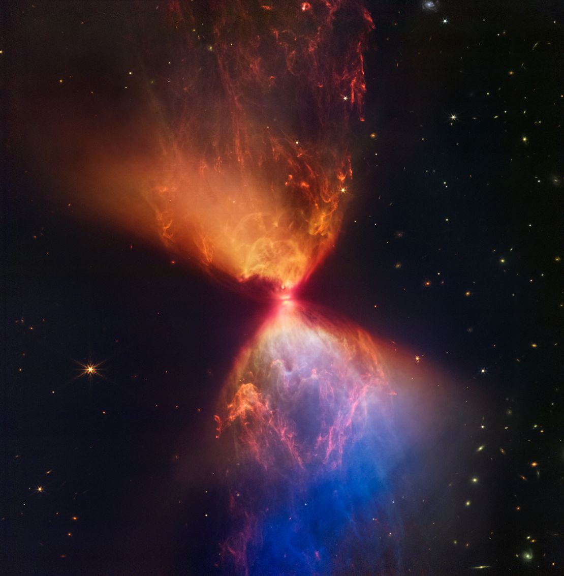 A newborn star is at the heart of a new James Webb Space Telescope image that looks like an hourglass. 