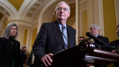 Senate Republican Leader Mitch McConnell, R-Ky., joined at left by Sen. Joni Ernst, R-Iowa, speaks to reporters following a lengthy closed-door meeting about the consequences of the GOP performance in the midterm election, at the Capitol in Washington, Tuesday, Nov. 15, 2022. 