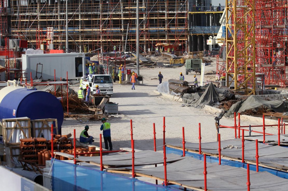 Migrant laborers work at a construction site at the Aspire Zone in Doha on March 26, 2016. 