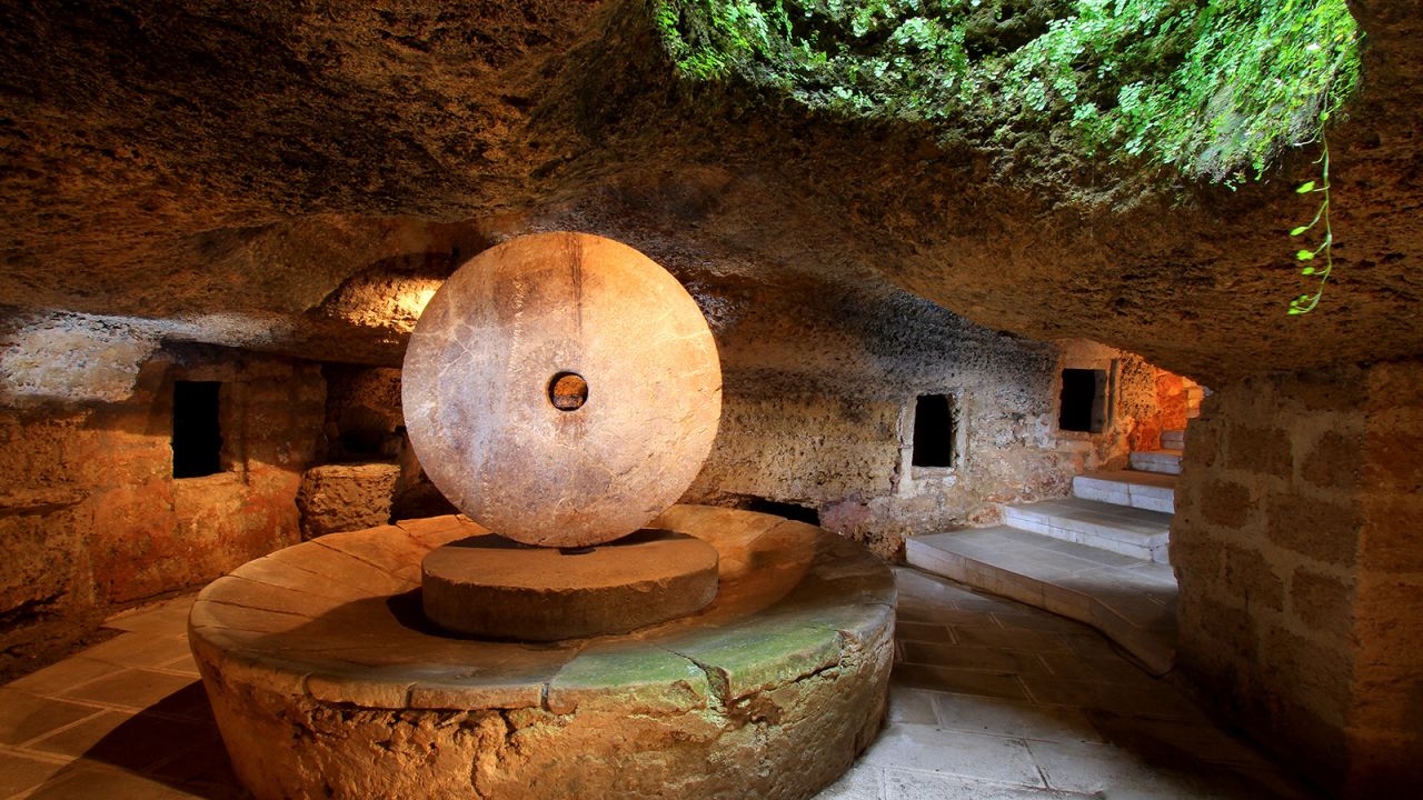 <strong>Subterranean secrets:</strong> Many of Presicce's buildings sit above caves or cellars carved into the rock beneath. Some still contain large, ancient olive mills.