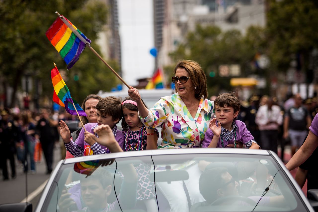 Pelosi rides in the San Francisco Gay Pride Parade in 2015. The parade came two days after the US Supreme Court's landmark decision to legalize same-sex marriage in all 50 states.