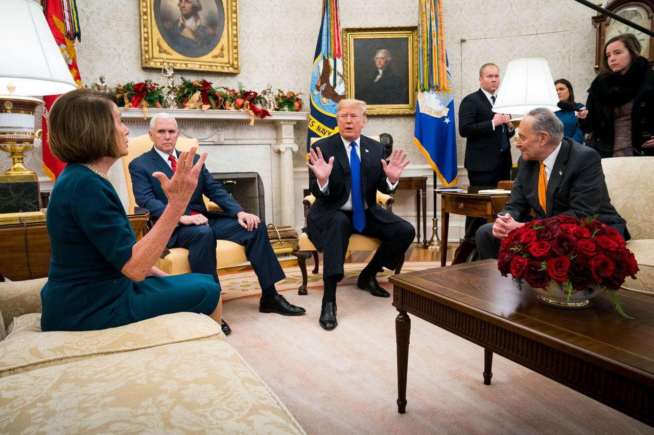 President Donald Trump and Vice President Mike Pence meet with Pelosi and Senate Minority Leader Chuck Schumer in the Oval Office at the White House in 2018. <a href="https://www.cnn.com/2018/12/12/politics/gallery/trump-pelosi-schumer-oval-office" target="_blank">They clashed</a> over funding for the border wall and the prospects of a government shutdown.