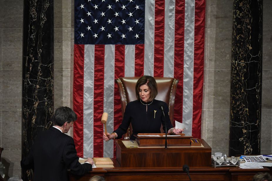 Pelosi bangs the gavel after the House <a href="https://www.cnn.com/2019/12/18/politics/house-impeachment-vote/index.html" target="_blank">voted to impeach President  Trump</a> in 2019. The House voted almost entirely along party lines to charge Trump with abuse of power and obstruction of Congress