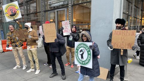 Starbucks workers picket a location in New York City, as part of a one-day strike at more than 100 stores nationwide.