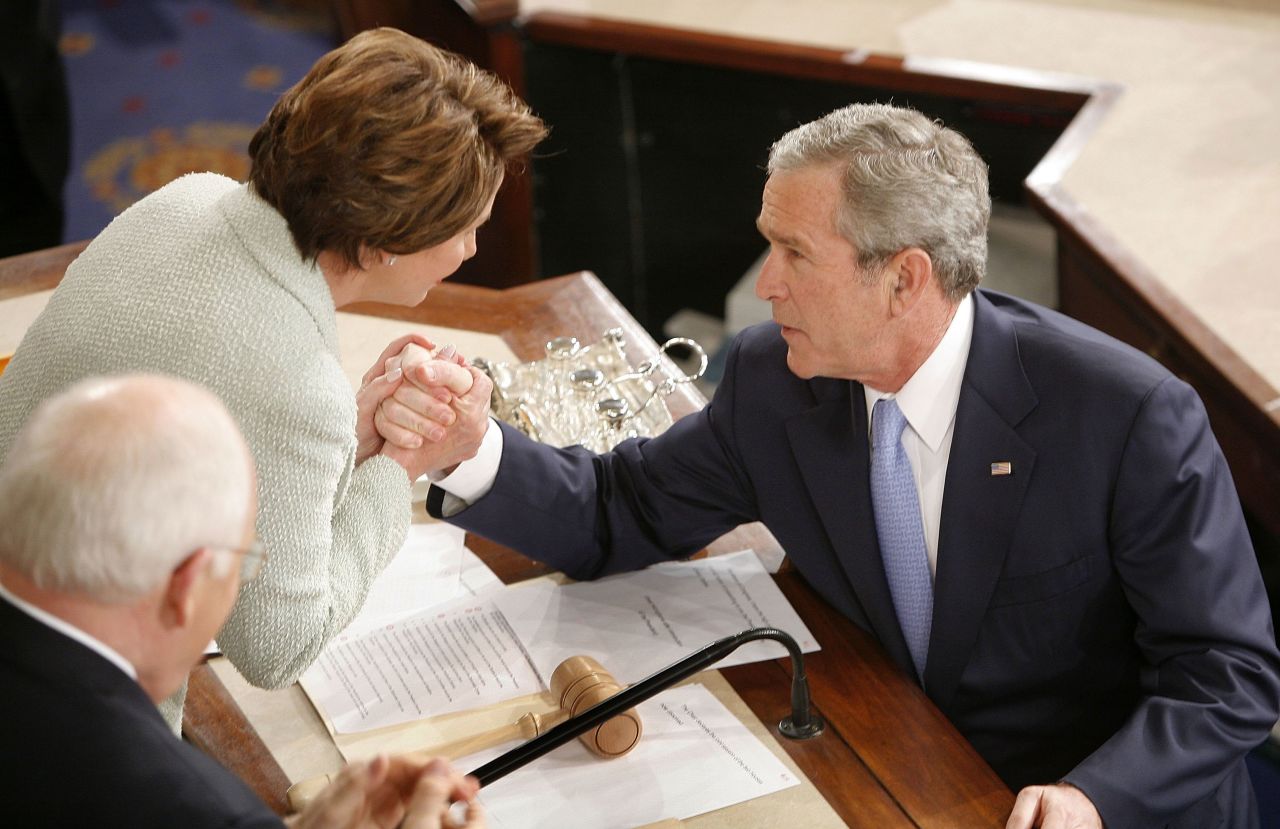 President George W. Bush shakes hands with Pelosi as Vice President Dick Cheney looks on after Bush delivered his State of the Union address in 2007.