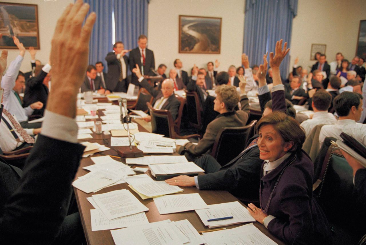Pelosi, right, votes during a House Appropriations Committee meeting on budget cuts in 1995.