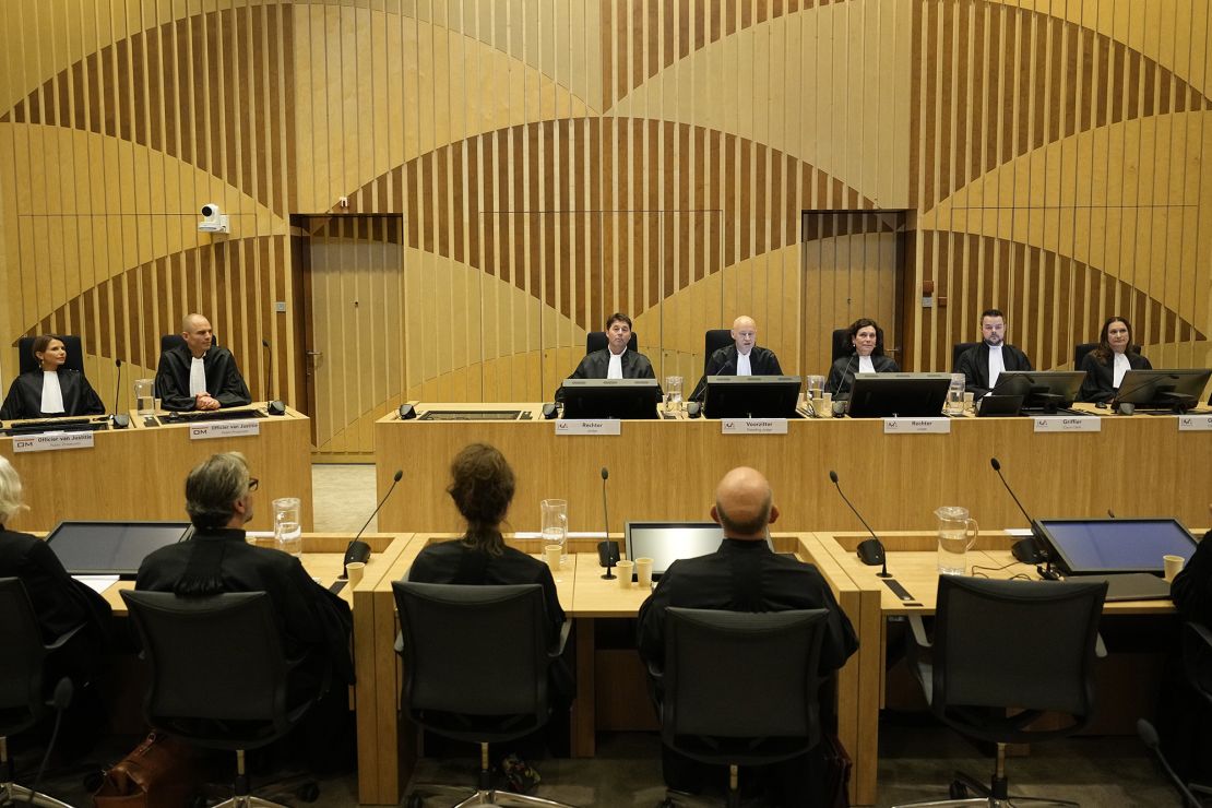 Presiding judge Hendrik Steenhuis, fourth from right, speaks during the verdict session of MH17 trial at Schiphol airport, near Amsterdam, Netherlands, November 17, 2022.