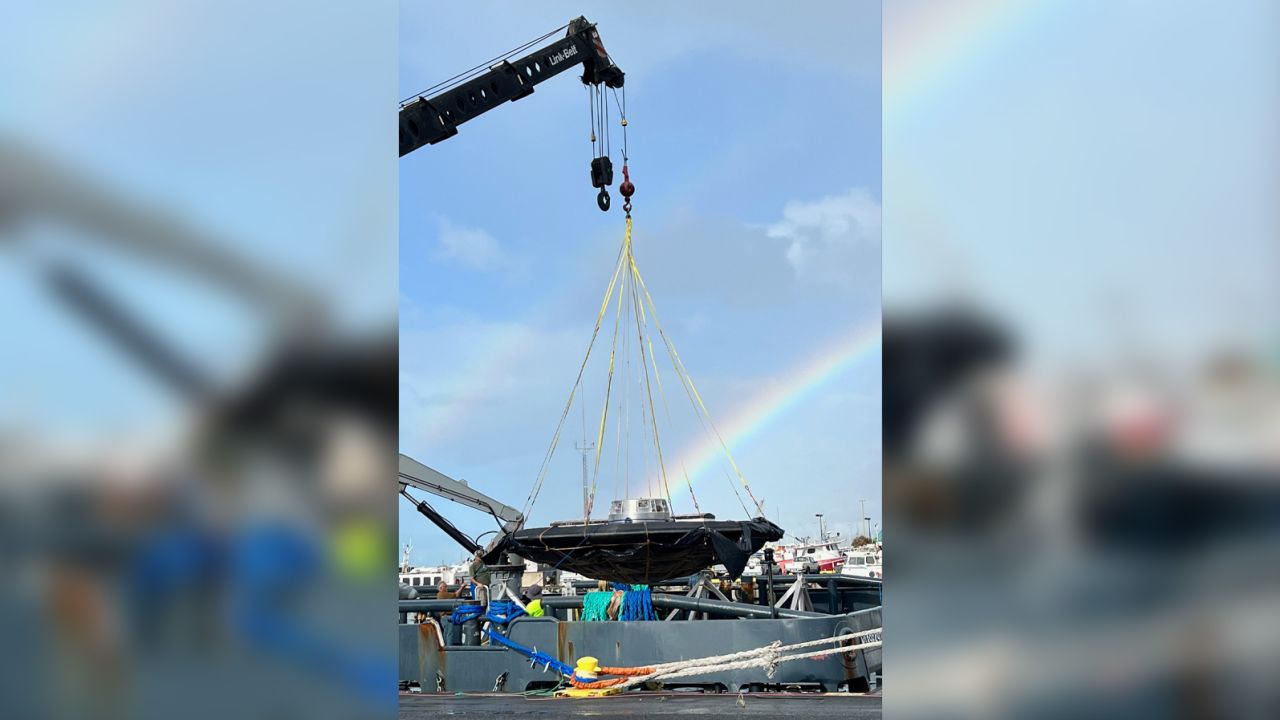 A double rainbow appeared across the sky over the LOFTID heat shield as it was transferred at port in Hawaii.