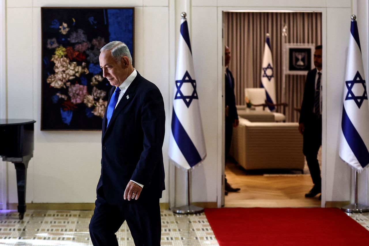 <a href="https://www.cnn.com/2021/05/31/middleeast/gallery/benjamin-netanyahu/index.html" target="_blank">Benjamin Netanyahu</a> attends a ceremony in Jerusalem on Sunday, November 13, where Israeli President Isaac Herzog handed him the mandate to form a new government following the victory of Netanyahu's right-wing alliance in this month's election. Netanyahu will return to power after being ousted as prime minister in 2021.
