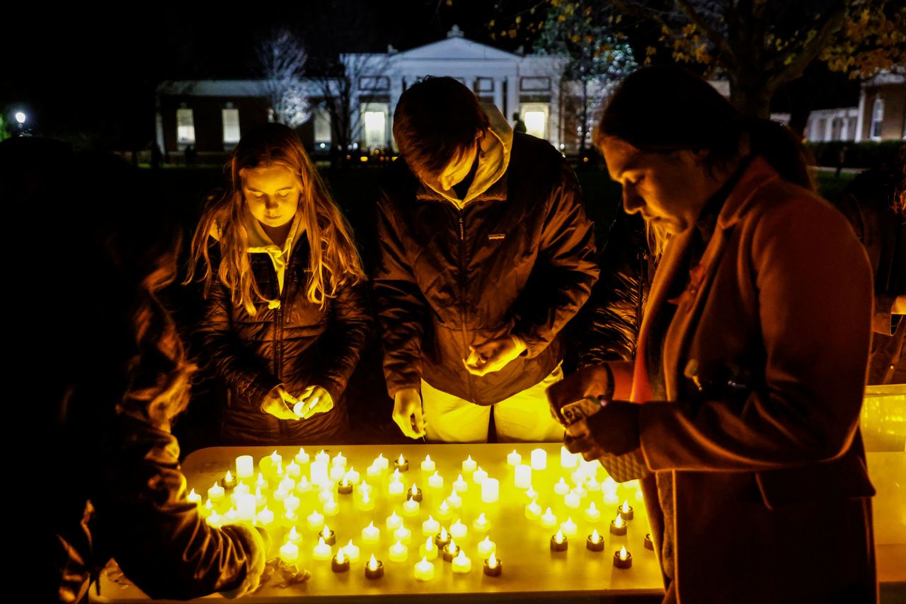 Students and community members gather for a candlelight vigil on Monday, November 14, after <a href="https://www.cnn.com/2022/11/14/us/uva-shooting-victims/index.html" target="_blank">a shooting left three students dead</a> at the University of Virginia in Charlottesville.