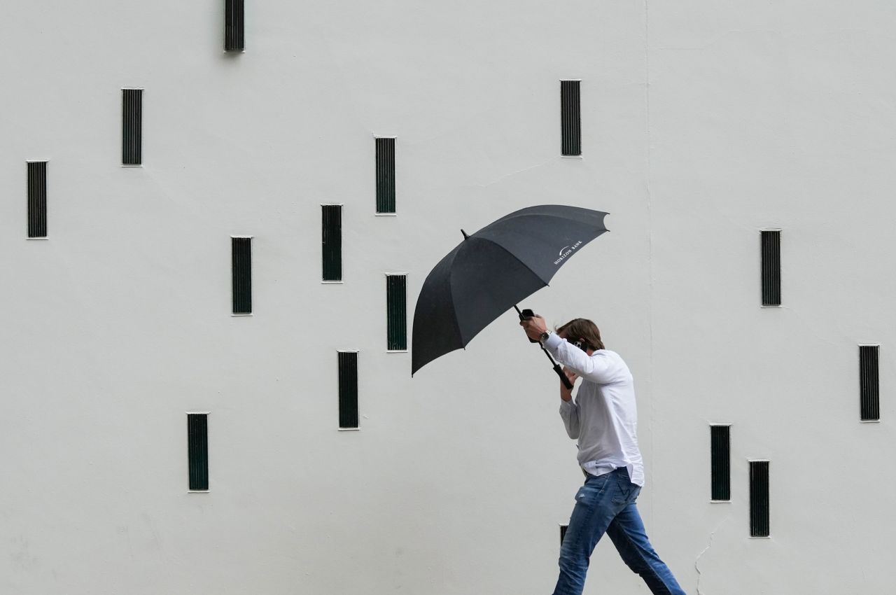 A man walks in the rain in Austin, Texas, on Friday, November 11.