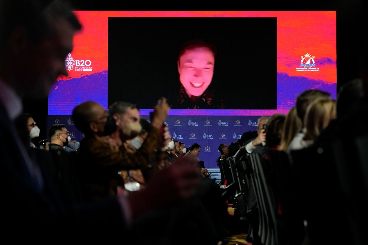 Elon Musk smiles during a virtual meeting at the B20 summit in Bali, Indonesia, on Monday, November 14. The Tesla CEO is <a href="https://www.cnn.com/2022/11/16/business/tesla-elon-musk-testimony-lawsuit" target="_blank">on trial this week</a> defending the $56 billion Tesla compensation package that helped make him the richest person in the world.