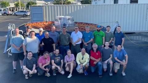 Members of the LOFTID research team are pictured with the aeroshell in Hawaii.