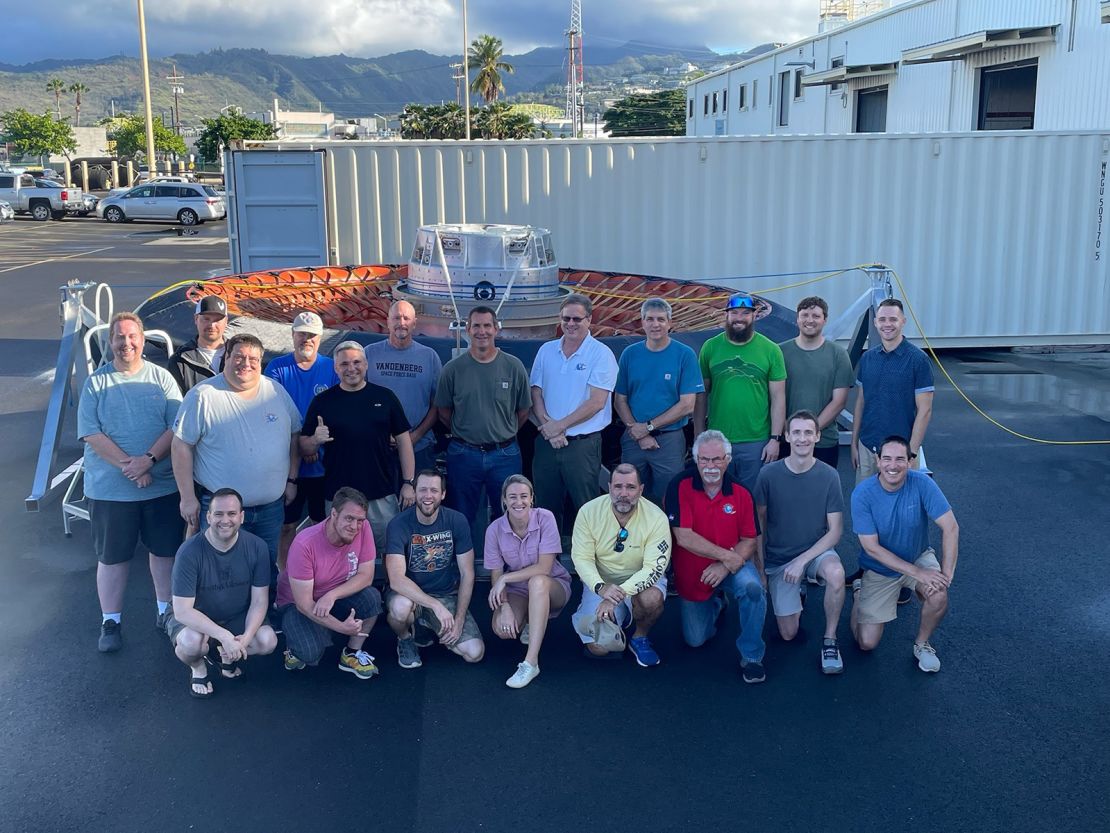 Members of the LOFTID research team are pictured with the aeroshell in Hawaii.