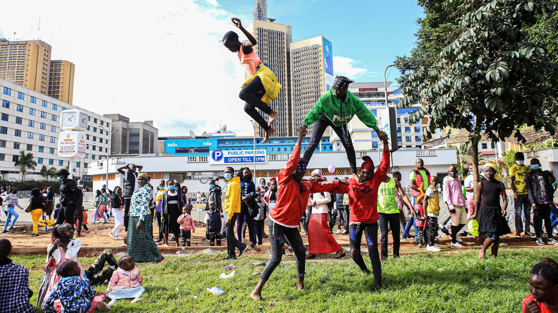 <strong>Nairobi, Kenya:</strong> A group of Kenya acrobats entertains people on Christmas Day. Most offices in the majority Christian nation shut down days before Christmas and reopen after the New Year. Kenyans take a collective break to relish long conversations and buffets filled with traditional delicacies.