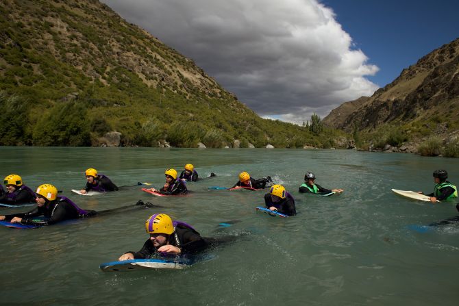 <strong>Queenstown, New Zealand:</strong> It's the start of summer here, and people celebrate Christmas with outdoor activities, such as river surfing.
