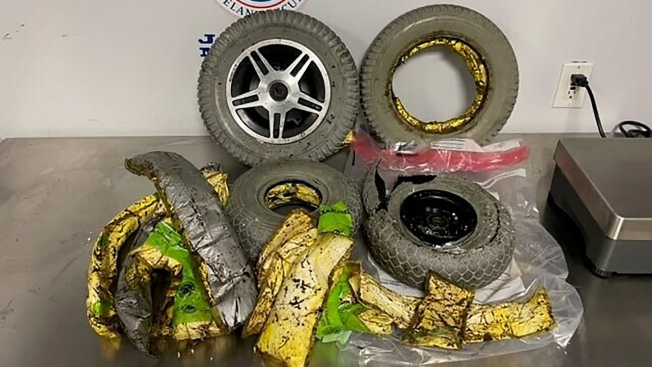 This photo provided by US Customs and Border Protection shows cocaine seized by customs officers from a traveler who was smuggling the drugs in the wheels of her wheelchair at New York's Kennedy International Airport. 