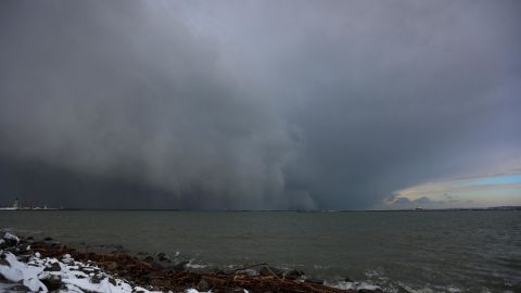 A cloud of snow is seen crossing Lake Erie on Friday.