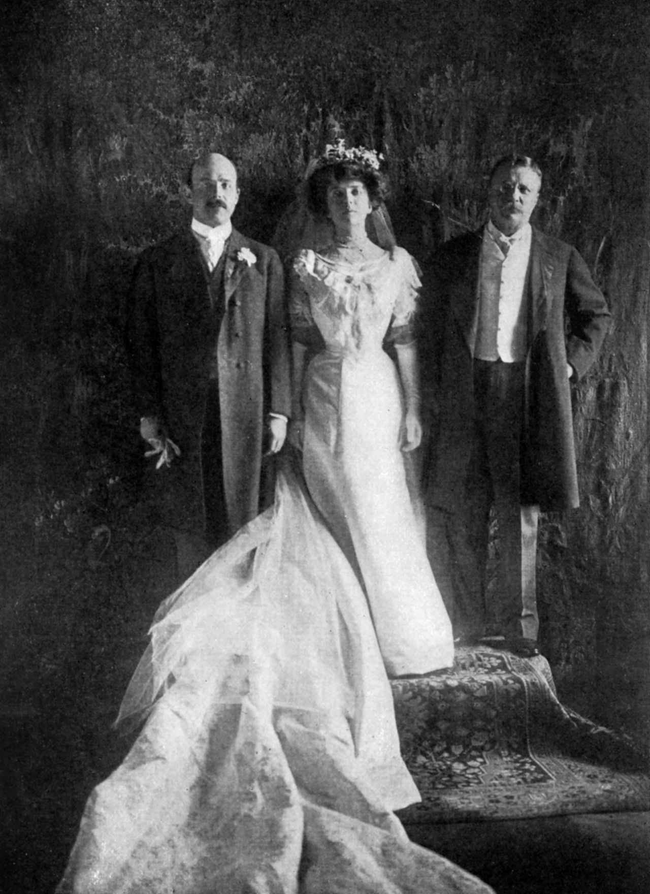 Alice Roosevelt and her husband, Nicholas Longworth, left, are joined by Alice's father, President Theodore Roosevelt, on their wedding day in 1906.