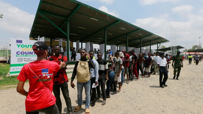 NextImg:Nigerians go to the polls in tense presidential election | CNN