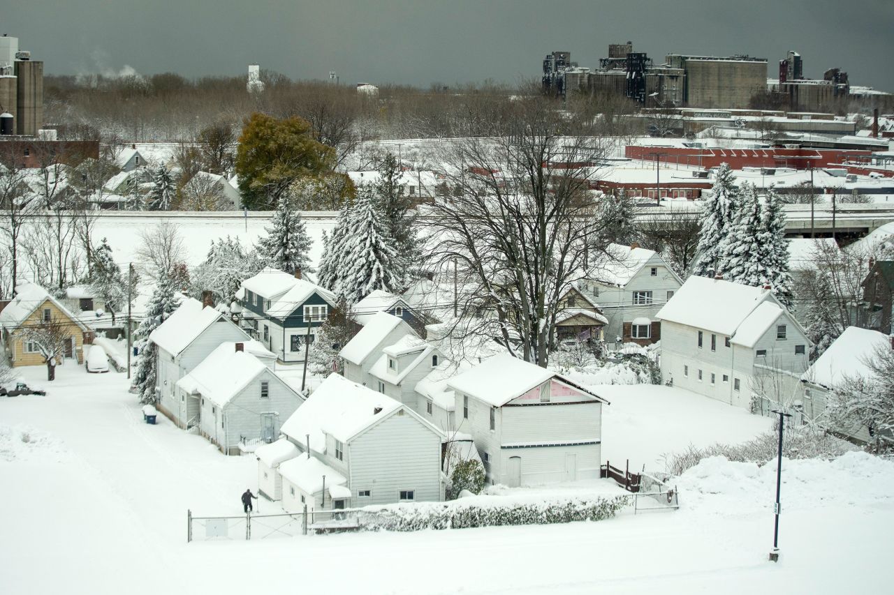Snow blankets homes on Friday.