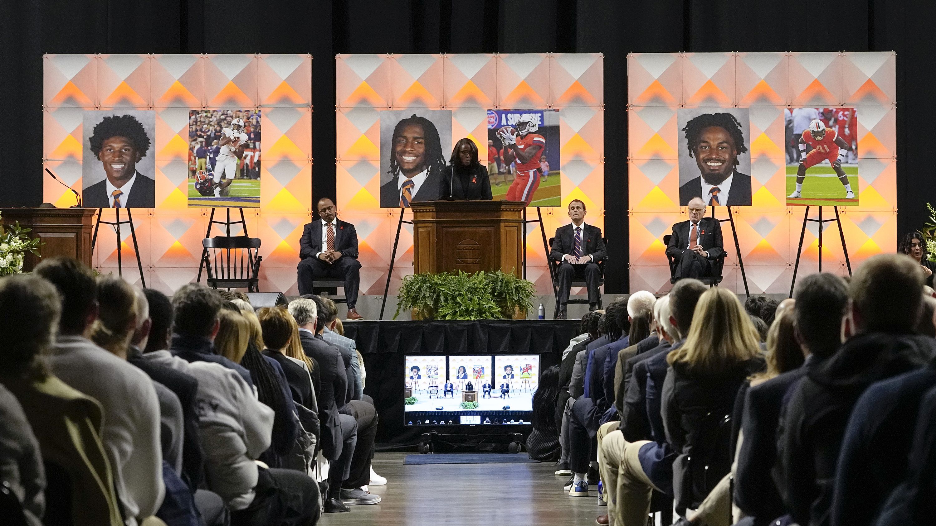 University of Virginia Athletic Director Carla Williams speaks during a memorial service for three slain University of Virginia football players Lavel Davis Jr., DSean Perry and Devin Chandler at John Paul Jones Arena at the school on November 19, 2022 in Charlottesville, Virginia. Christopher Darnell Jones Jr. was apprehended in connection with the shooting in which three university football players were killed and two others wounded.