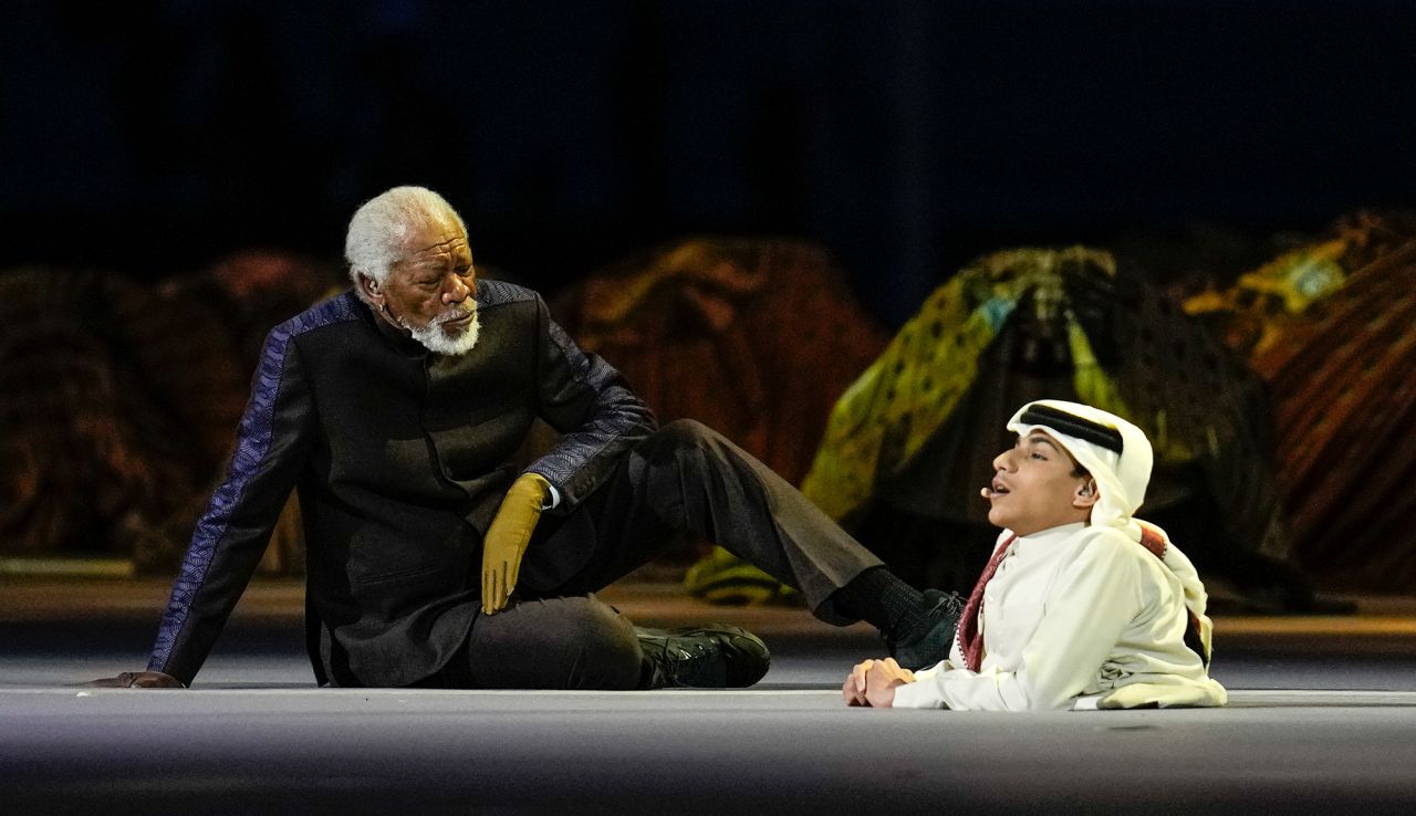 Actor Morgan Freeman and Qatari YouTuber Ghanim al Muftah take part in the opening ceremony Sunday.