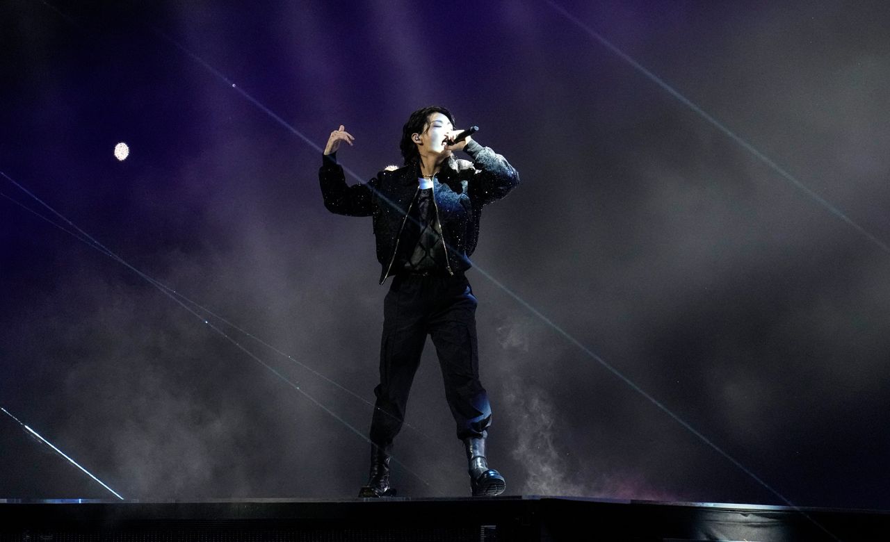 South Korean singer Jung Kook performs at the opening ceremony.