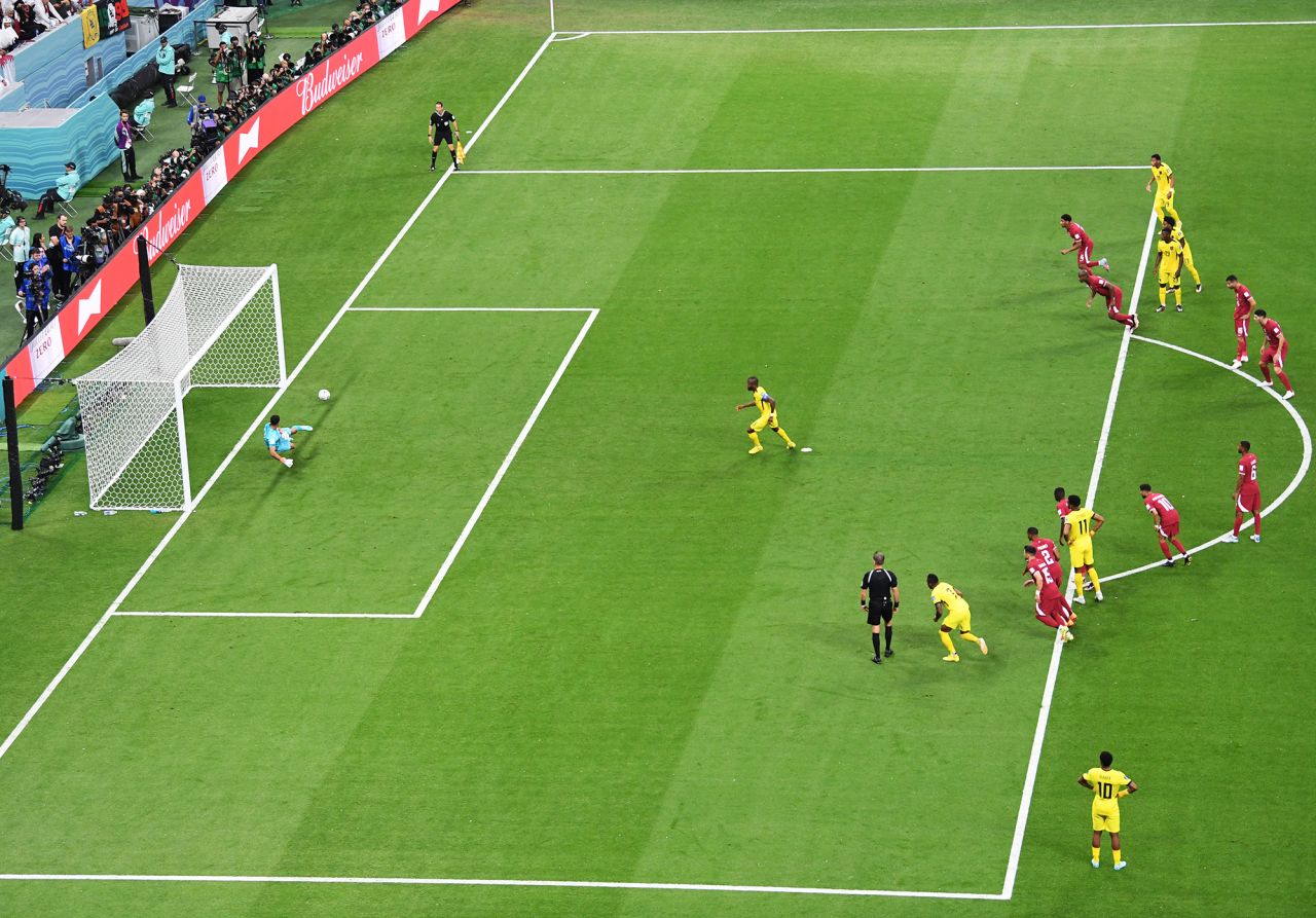 Valencia slots a penalty kick past Qatari goalkeeper Saad Al Sheeb to open the scoring in the 16th minute.