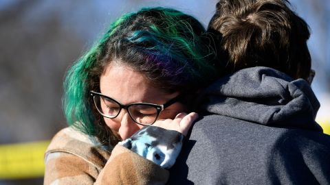 Jesse Smith Cruz embraces Jadzia Dax McClendon the morning after the mass shooting at Club Q in Colorado Springs, Colorado on November 20, 2022.