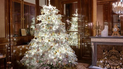 Twinkling holiday lights set off ornate interiors at Paris' famed Hôtel de Crillon.