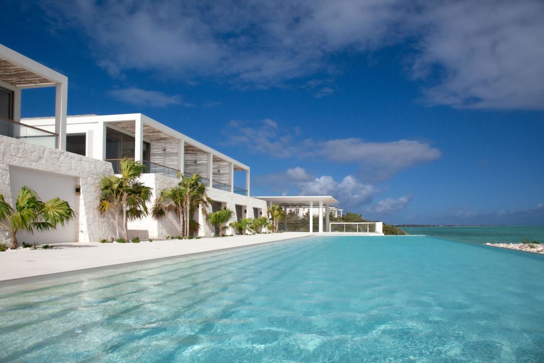 Who says Christmas is all about evergreens? We'll take the palm trees at Rock House in Turks and Caicos.