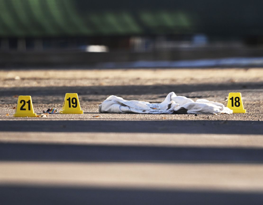 Evidence is marked by authorities outside Club Q in Colorado Springs on the morning after the shooting.
