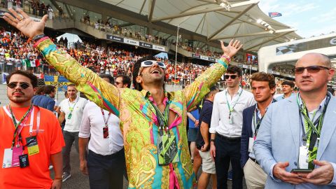 Bollywood actor Ranveer Singh poses for a photo on the grid prior to the F1 Grand Prix of Abu Dhabi at Yas Marina Circuit on Sunday in Abu Dhabi, UAE.