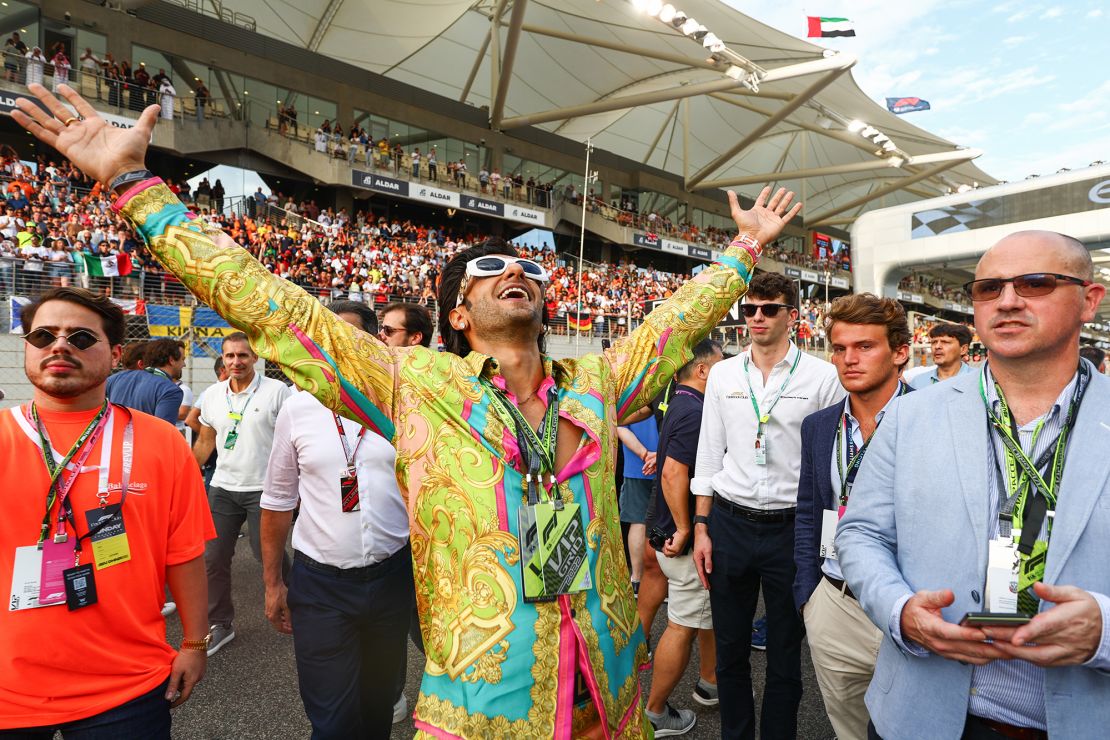 Bollywood actor Ranveer Singh poses for a photo on the grid prior to the F1 Grand Prix of Abu Dhabi at Yas Marina Circuit on Sunday in Abu Dhabi, UAE.  