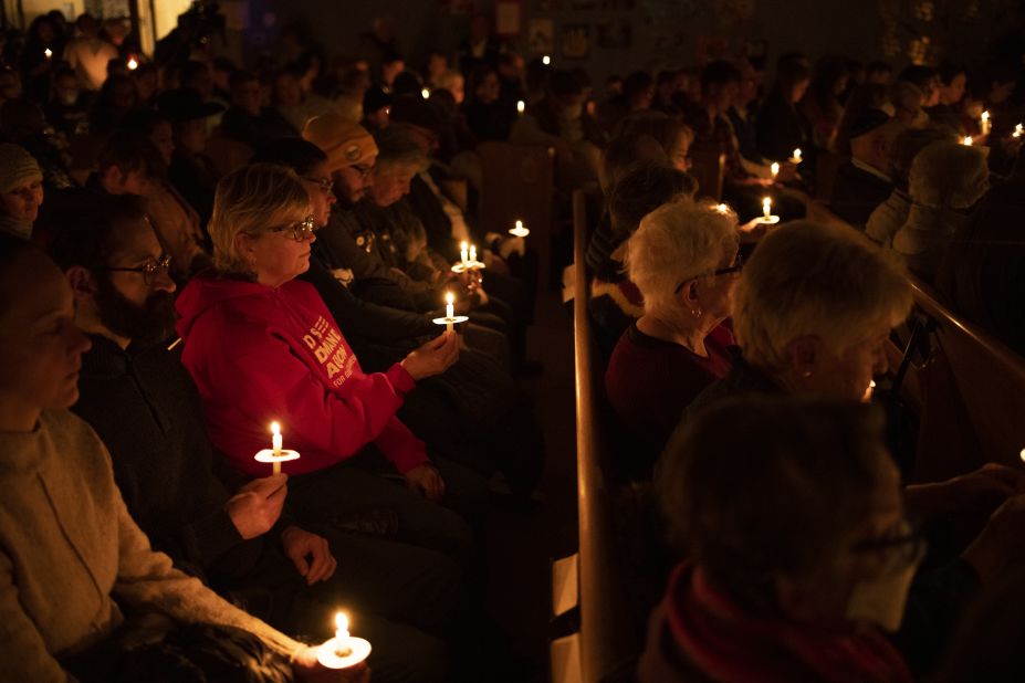 People attend a vigil at Temple Beit Torah in Colorado Springs on Sunday, November 20.