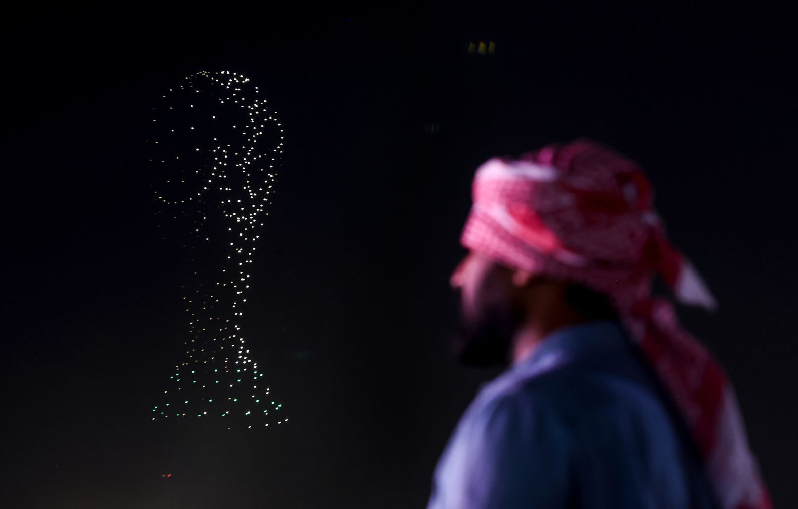 A light show is displayed over the skyline in Doha on November 20.